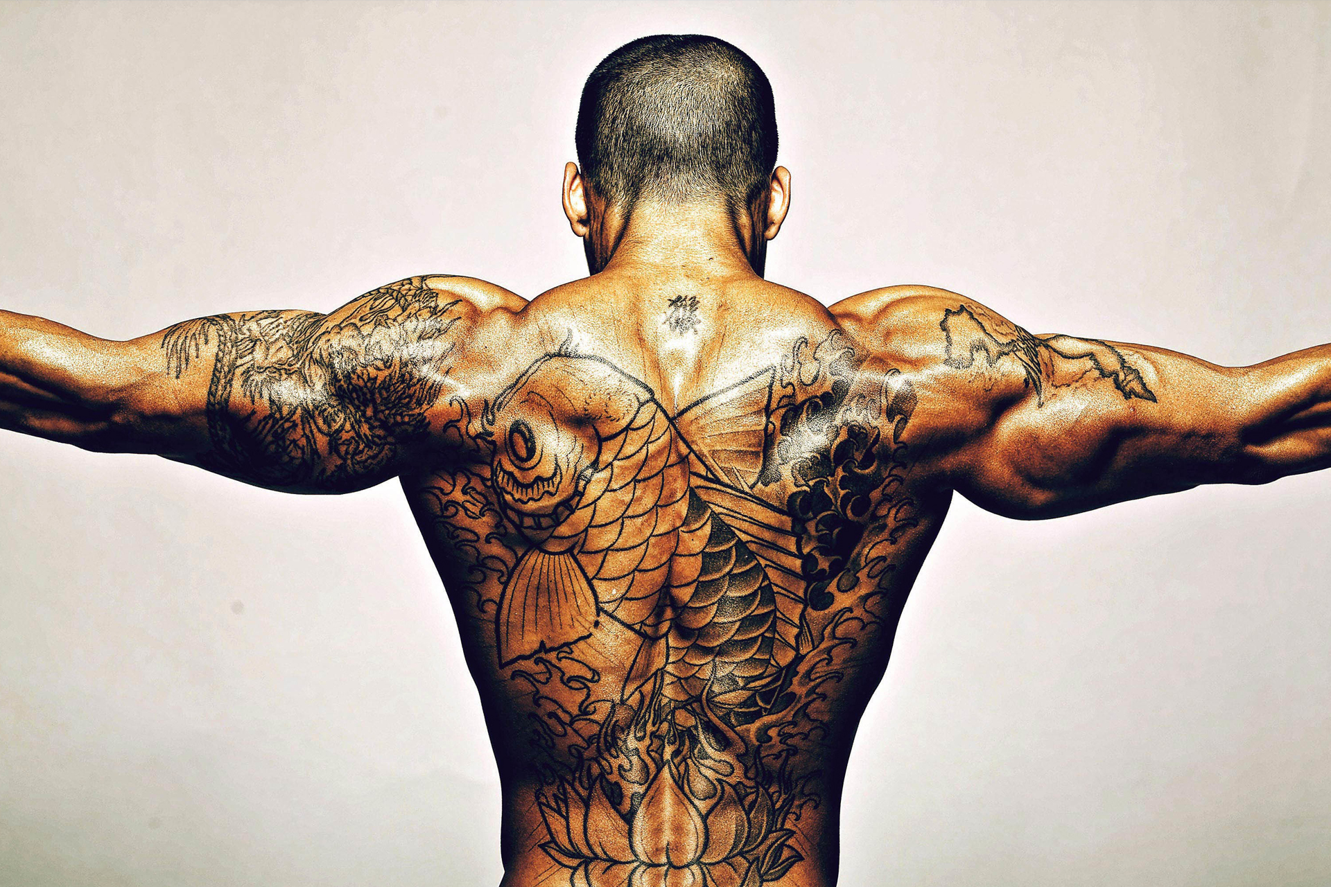 25 Best Blackwork Tattoos For Men in 2023