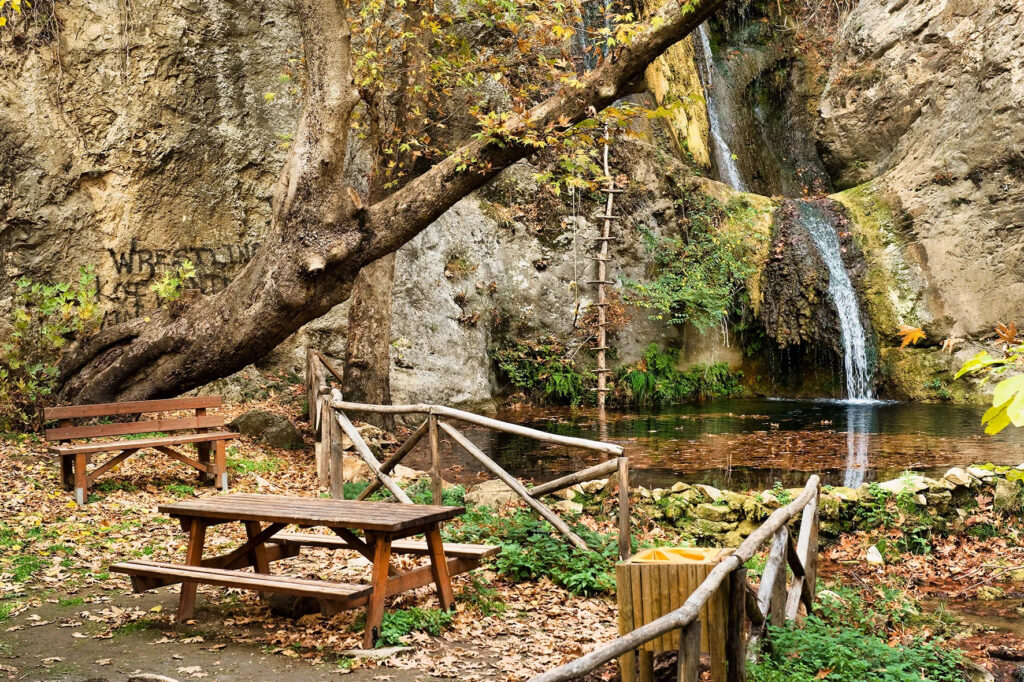 A gorgeous set of waterfalls nestled among perennial plane trees